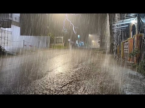 Nobody Thought the Rain Would Last This Long and Flood the Street at Night