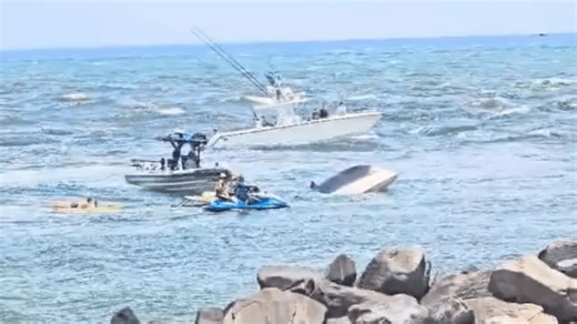 2 rescued after boat capsizes at Haulover Inlet