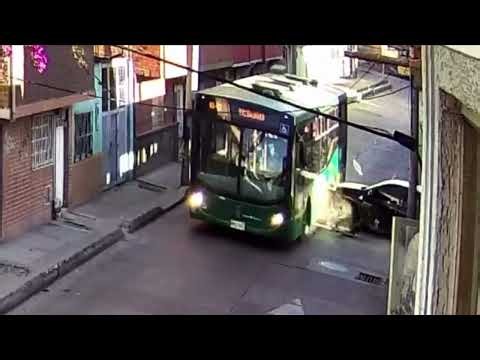 Car Blows Through Stop Sign and Slams Into Bus