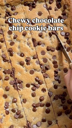 These Nestlé Toll House Cookie Bars are soft, chewy, and melt-in-your-mouth delicious! 🍪 If you love classic chocolate chip cookies but want something even easier to make, these chocolate chip cookie bars are the perfect dessert. They bake up thick and buttery with golden edges, a soft chewy center, and plenty of gooey chocolate chips in every bite. This easy cookie bar recipe is made with simple pantry staples — no scooping or chilling dough needed. Just mix, press into a pan, and bake! They’r