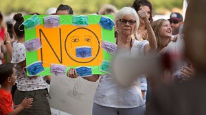 As community members protest, students take the lead in mask wearing