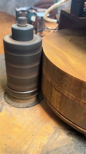 Rounding the edges of a log or wooden block.