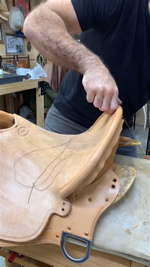Hand stitching leather saddle a satisfying traditional saddlery process