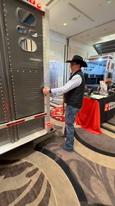 Check out this Ranch Hand gooseneck livestock trailer on display at the Roper Cowboy Marketplace in Las Vegas this week! #wilsontrailer #wilsontrailers #nationalfinalsrodeo #ropercowboymarketplace | Wilson Trailer Company
