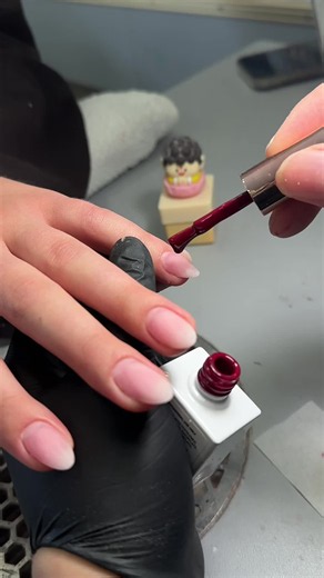 Red nails painted with a separate brush — cleaner, faster shape