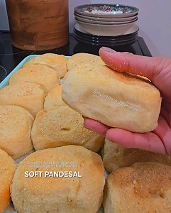 SOFT PANDESAL PANDESAL NA DI TUMITIGAS This recipe creates soft, fluffy pandesal, perfect for breakfast or snacks. Ingredients First Dough: 2/3 cup warm water 1 tbsp sugar 1 packet active dry yeast (2 1/4 tsp) 1 cup all-purpose flour Dry Ingredients: 3 cups bread flour 1 tsp salt 1/4 cup powdered milk Wet Ingredients: 1 large egg 2/3 cup granulated sugar 1/4 cup melted butter 2/3 cup warm milk For Coating: Bread crumbs Instructions Step 1: Make the First Dough 1. In a bowl, mix warm water, sugar