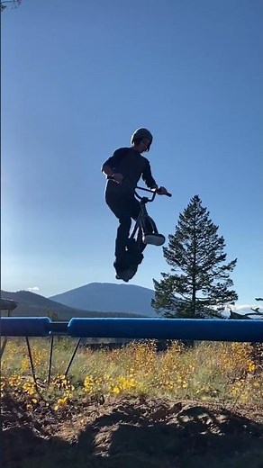 The Smoothest Trampoline Bike Tricks in Slow-Mo!!
