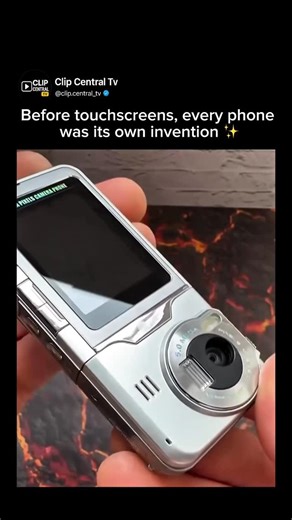Clip.Central Tv on Instagram: "✨.. What you’re looking at is a pre-smartphone era camera phone, from a time when manufacturers were experimenting instead of copying one rectangle. This model featured a physical camera lens module, mechanical buttons, metal housing, and a design that actually changed how you used the device. Back then, brands competed on hardware creativity — swivel cameras, slide-outs, flip mechanisms, and dedicated camera controls. Each phone felt unique, had its own personalit
