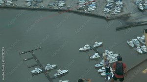 Parachuter falling from zipline on skyscraper - super slow motion at 1000 FPS