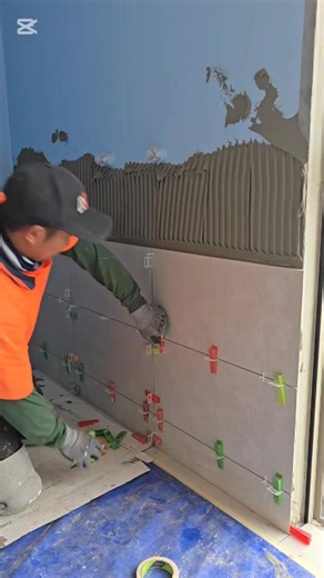 Putting up wall tiles 300x600mm #tiles #tilework #How #tileinstallation #construction #tips #trendingreelsvideo #reelsfypシ #followersreelsfypシ゚viralシfypシ゚viralシ #fypageシ | R & K Tiling Services Ltd.