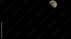 Moon Timelapse, Stock time lapse : Full moon rise in dark nature sky, night time. Full moon disk time lapse with moon light up in night dark black sky. High-quality free video footage or timelapse