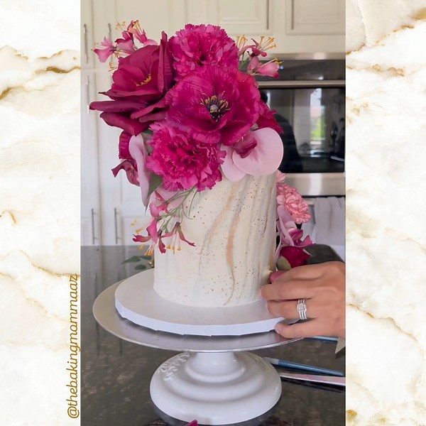 See just how easy and quick it is to decorate with our Icing Sheets! @thebakingmommaaz created this stunning cake using the Icing Sheet Gilded Marble ✨🤍 🌸 Shop all our Icing Sheet designs here - https://bit.ly/3qE8WOp ✨🤍🌸 #evilcakegenius #icingsheet #flowers #cake #cakeproducts #cakedecoratingtools #cakeflowers | Evil Cake Genius