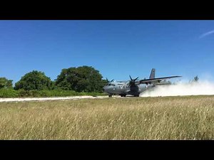 CASA C-295 landing on beach sand strip