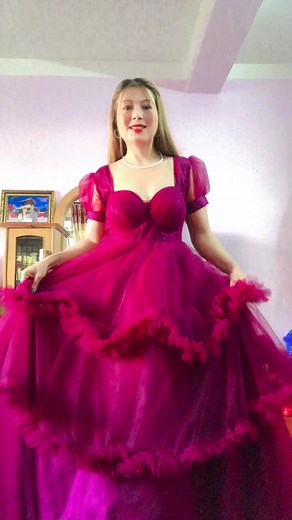 Elegant Pink Tiered Ball Gown Twirls and Poses