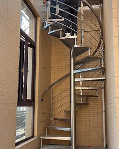 Compact Spiral Staircase: The Ultimate Urban Space-Saver Built for tight city spaces, this staircase delivers functionality without sacrificing style: ✅ Space-saving spiral design (fits in narrow alleys and small backyards) ✅ Anti-slip diamond plate steps (stable even in rainy city weather) ✅ Rust-proof stainless steel (stands up to urban pollution and humidity) ✅ Slim-profile railing (maximizes usable space in tight corridors) ✅ Customizable height (perfect for multi-story city homes and townho