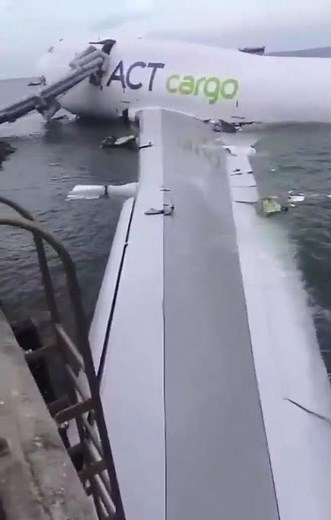 2 dead as Boeing 747 cargo plane crashes off runway into sea at Hong Kong airport