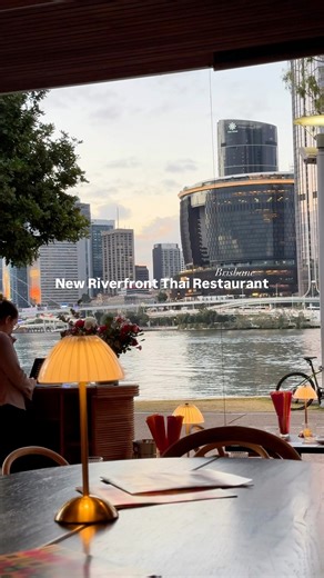 [ NEW ] 📣 Brisbane Just Scored Its Most Photogenic Thai Restaurant There’s a brand new Thai restaurant in South Bank and if you’re into big flavour, bold interiors, and even bolder cocktails, this one needs to be on your radar. Naga Thai has finally reopened after 3 years and it’s in a fancy new spot. A technicolour dream where retro meets riverfront. Step inside and you’ll find huge glowing lanterns hanging from the ceiling, vintage 60s design details, and panoramic views of the Brisbane skyli