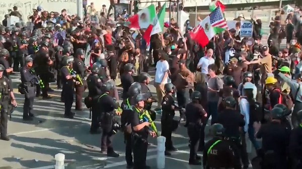 Anti-ICE raid demonstrators protest into fourth night