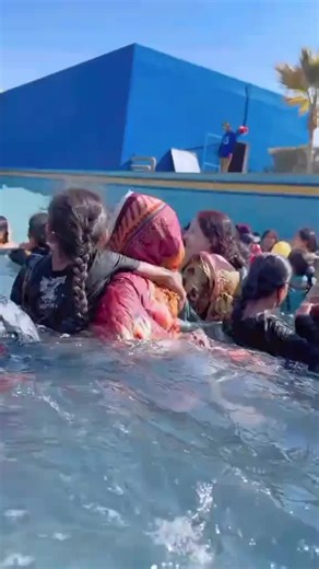 Girls Having Fun in the Swimming Pool