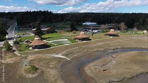 Cinematic 4K aerial drone trucking shot of Swinomish Village, Swinomish Channel in La Conner on a native American indian tribal reservation in Washington