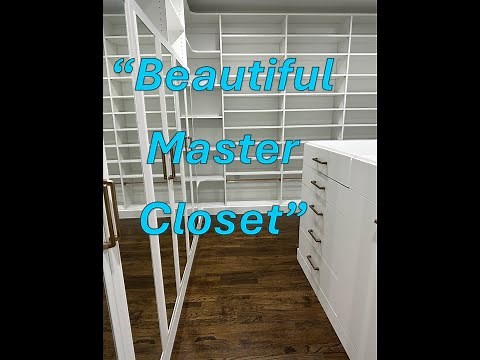 Luxury White Walk-In Closet with Island and Mirrored Doors | Neatly Dunn Closets