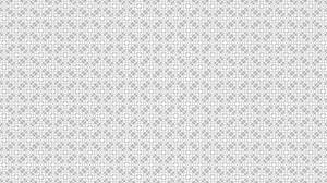 Graphic motif in black and white composed of chained circles with stroboscopic and hypnotic effect, which rotates clockwise and increases in size.