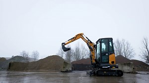Take a closer look at the CASE CX20D, a short radius 2-ton excavator powered by a 13.7 kW Stage V engine. As the smallest model in the industry with a 2-piece boom, it offers 30% higher dumping height, 10% longer horizontal reach, and 100 mm more digging depth compared to standard mono-boom designs. The innovative 2 hinge points geometry also lets you dig much closer to the machine. | CASE Construction Equipment