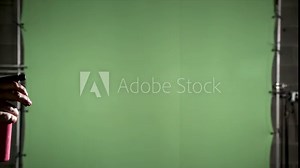 Slow motion red blood mist from a spray bottle on green screen for use with visual effects and or design and texturing. Viewed sideways. Stock Video