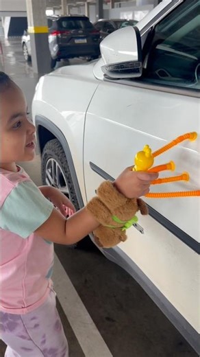 A spring-loaded bug got stuck to the car! 🚗 😅 #funny #shorts #youtubeshorts