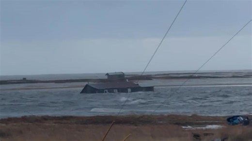 Home floats away as Typhoon Halong hits western Alaska's coastal communities