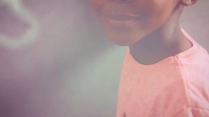 Animation of math formulas over african american boy smiling at camera. school, education and learning concept digitally generated video.