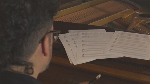 Musician composing a song on piano - Free Stock Video