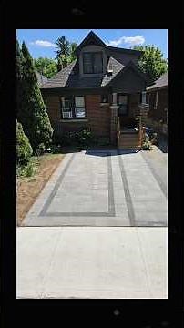 Transforming curb appeal: Asphalt driveway demo & custom interlocking installation with dual border!
