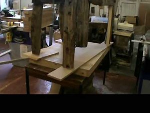 Furniture making. Trimming table legs
