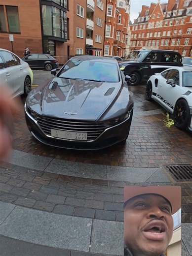 Say Hello to the King While Riding in an Aston Martin