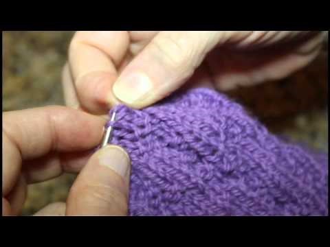 How to fix a (serious) mistake by unraveling the knitting and reclaiming the live stitches.
