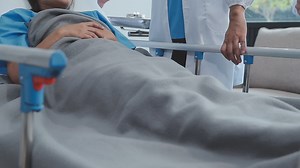 Download Doctor explaining report to patient in the hospital for free