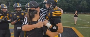Army reservist poses as football referee to surprise his kids