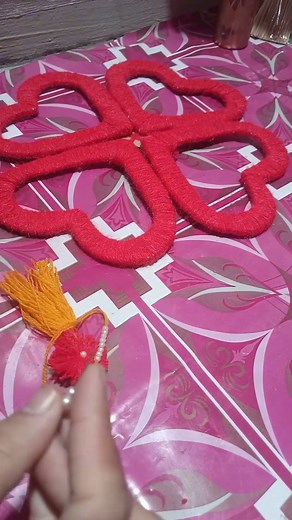 "Beautiful Woolen Flowers Making | DIY Pasham Thread Flowers"2. "Pasham Thread Flower Craft