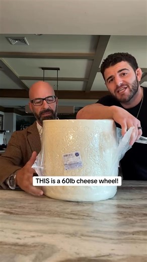 Cutting a 60lb cheese wheel. What should we make in it? 🧀 | Johnny Drinks