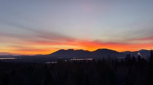 The sunrise 🌄 in Eustis 🏔️ Maine 🌲 on Saturday, December 23, 2023 as a chickadee sings its 2 note 🎵 song | Eustis Maine Scenery