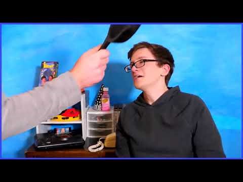 Scott the woz gets hit by a frying pan.mp4
