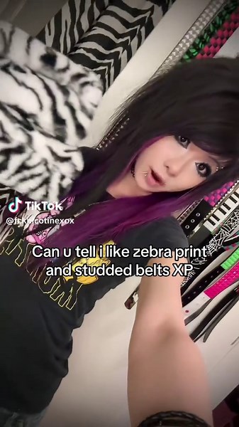 Nostalgic Emo Fashion: Studded Belts and Zebra Print