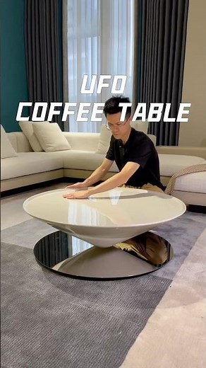 A coffee table that floats… dual-disc UFO silhouette