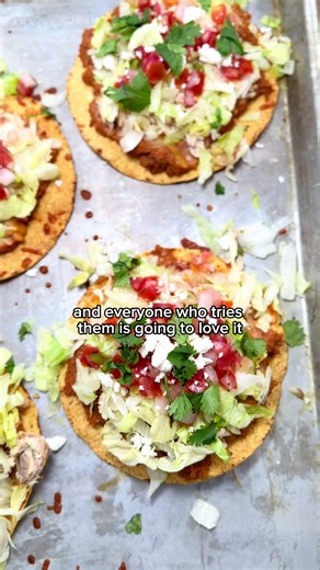 15 minute Chicken Tostadas These easy Chicken Tostadas are the perfect weeknight dinner dish. They come together in under 20 minutes and are delicious. They are made with chicken, refried beans, cheese, lettuce, pico, and cilantro piled high on a baked tostada shell. These are simple to make and are always a crowd favorite Get the recipe here: https://alexdaynes.com/chicken-tostadas/ #chickentostadas #chickentostada #tostada #15minutemeal #dinneridea #dinnerecipe #easydinner #dinnerrecipes