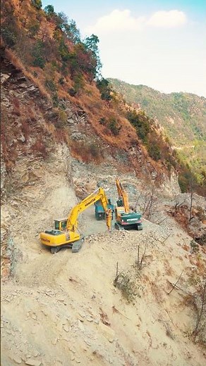 Building Powerful Risky Road with Excavators