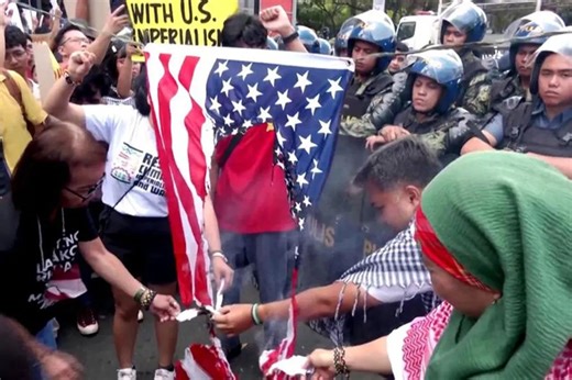 Filipino activists burn US flag in condemnation of US-Israel attacks on Iran | ABS-CBN News