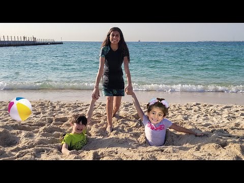 Deema and Sally play stuck in the sand rescue Adventure