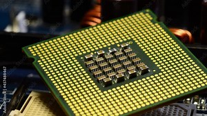 detail of the surface of the computer cpu on a motherboard close-up. macro shot.