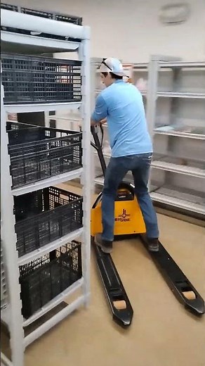 Riding an electric pallet jack